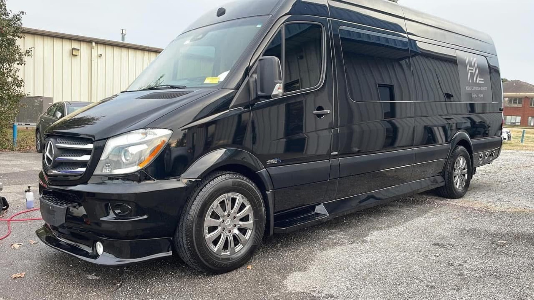 Black Sprinter van after exterior detailing