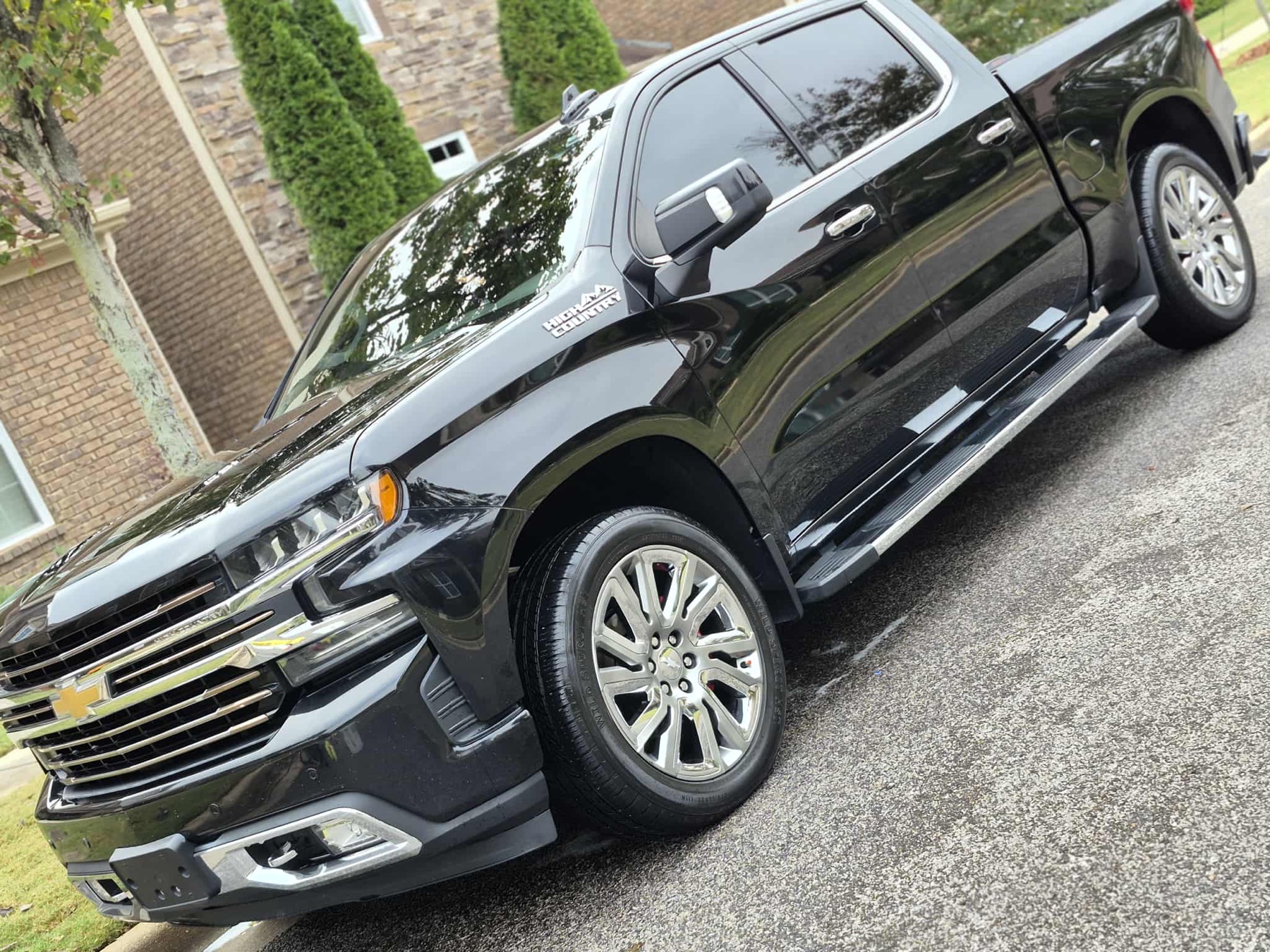 Black Chevrolet truck after exterior detailing